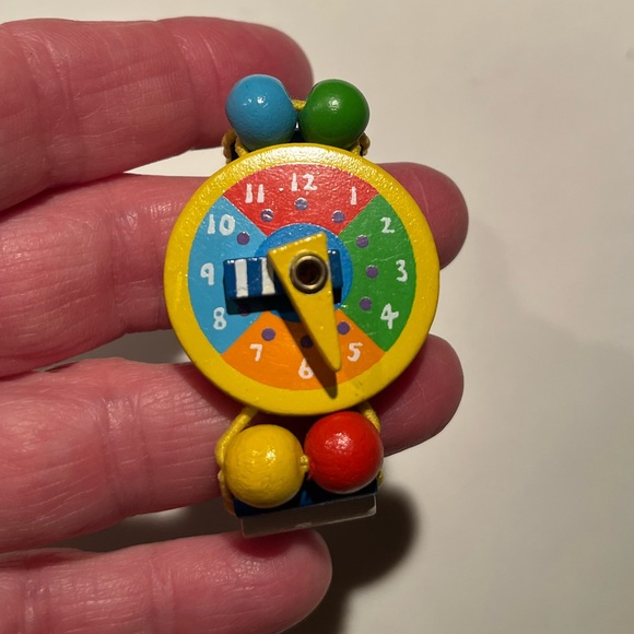 Elastic wooden tatiri watch for kids.  Helps teach kids how to read time. - Picture 2 of 8